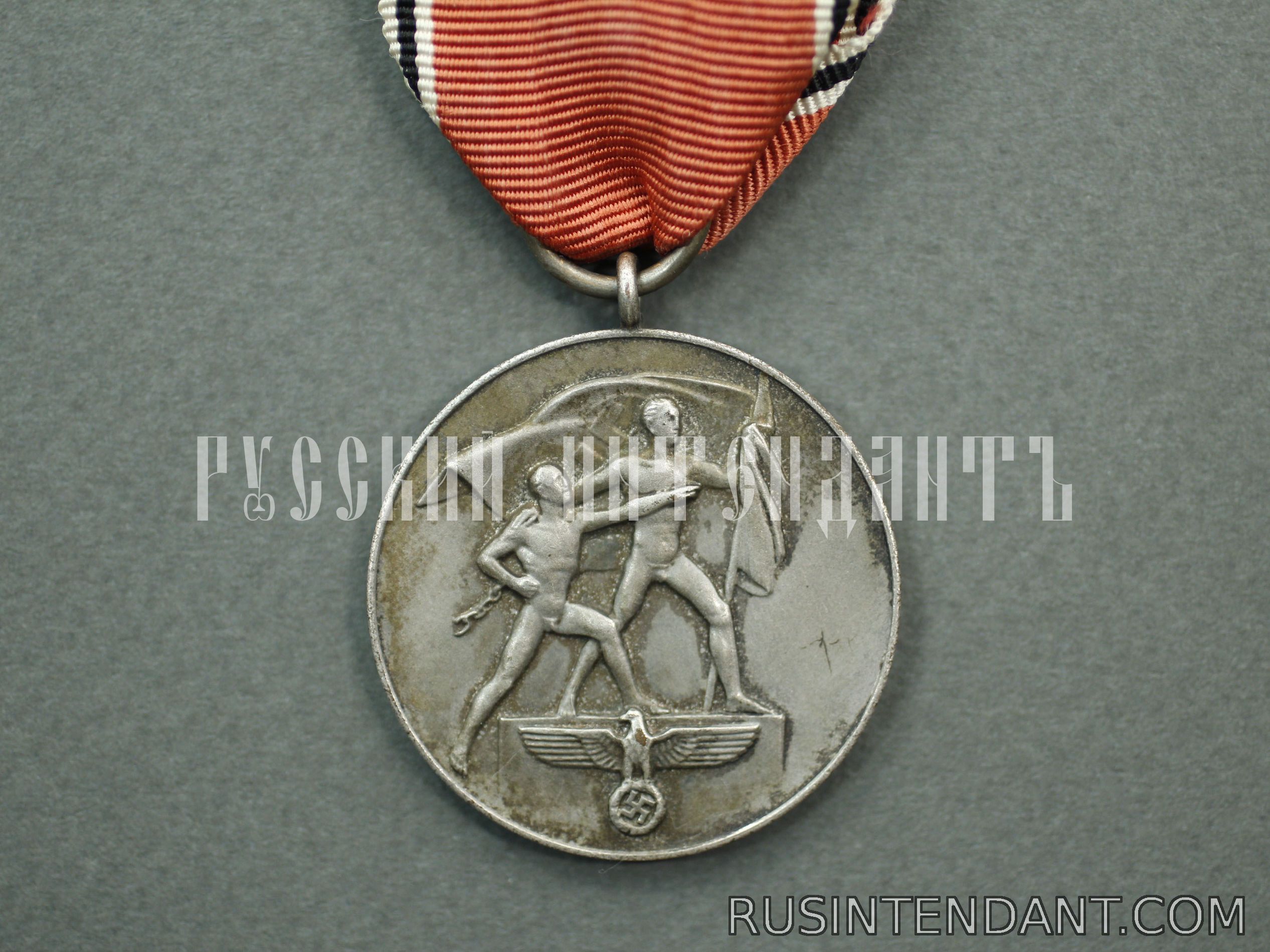 Фото 1: Медаль "В память 13 марта 1938 года" 