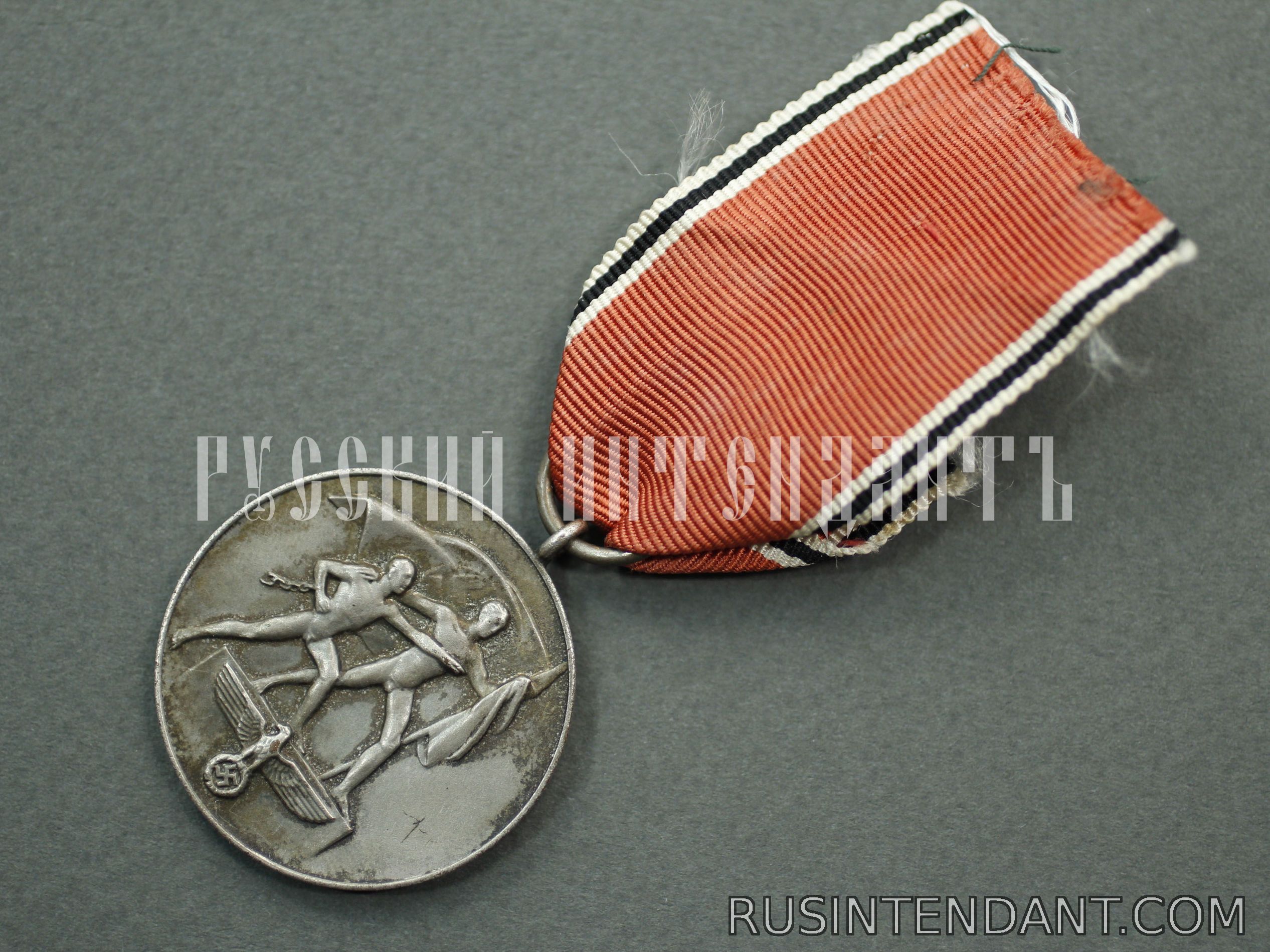 Фото 3: Медаль "В память 13 марта 1938 года" 