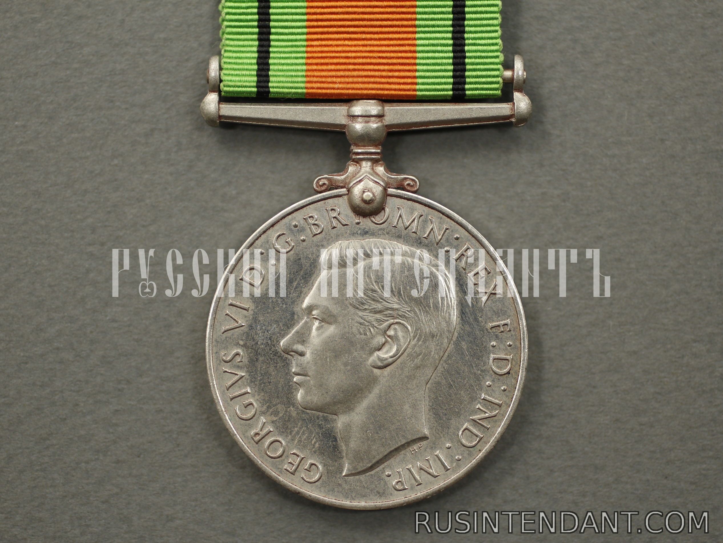 Фото 1: Английская медаль "За оборону" 