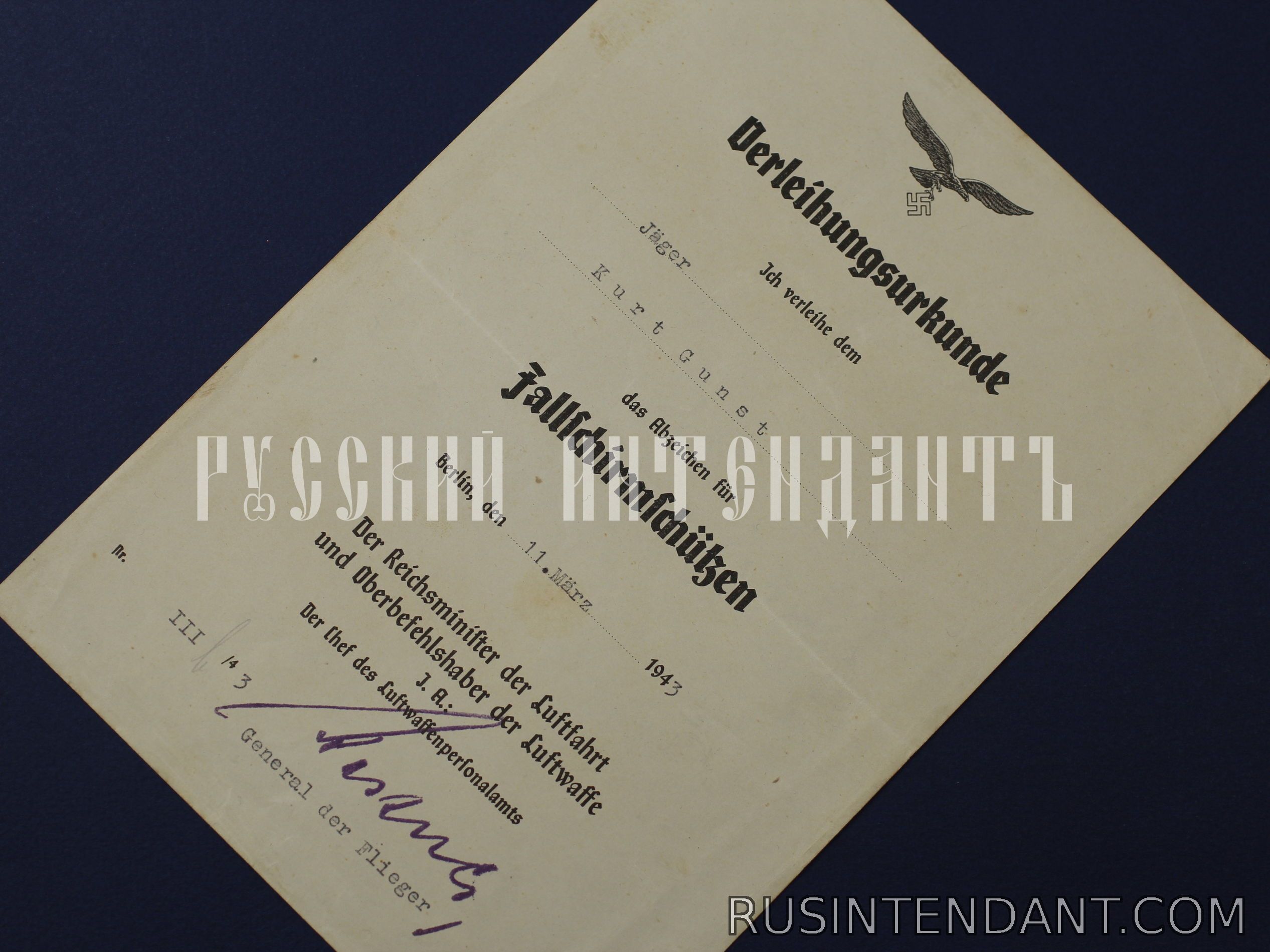 Фото 2: Квалификационный знак Парашютист-стрелок Люфтваффе с наградным листом 