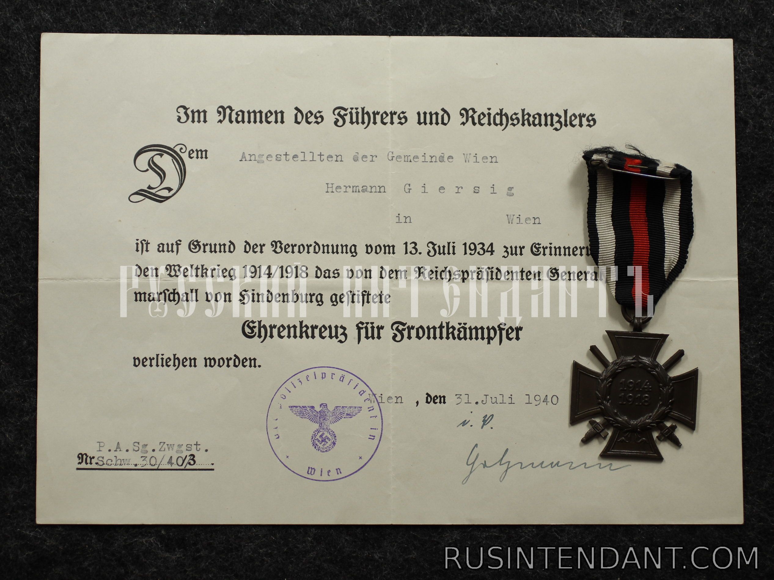 Фото 1: Почётный крест Мировой войны 1914–1918 с наградным листом 
