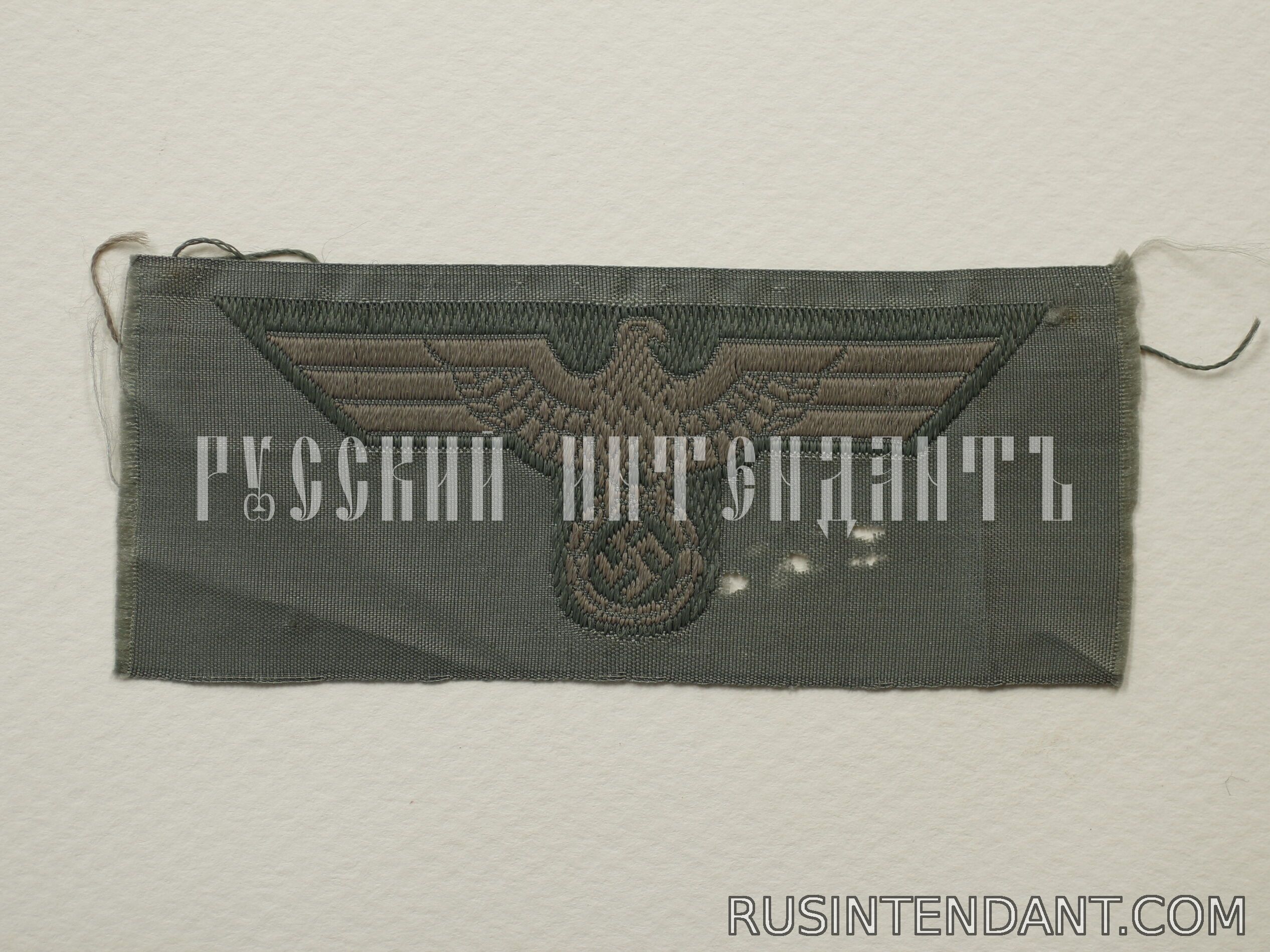 Фото 1: Эмблема на головные уборы Вермахта 