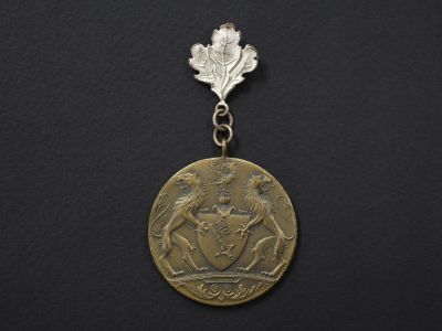 Знак победителя соревнований по комбинированной охоте