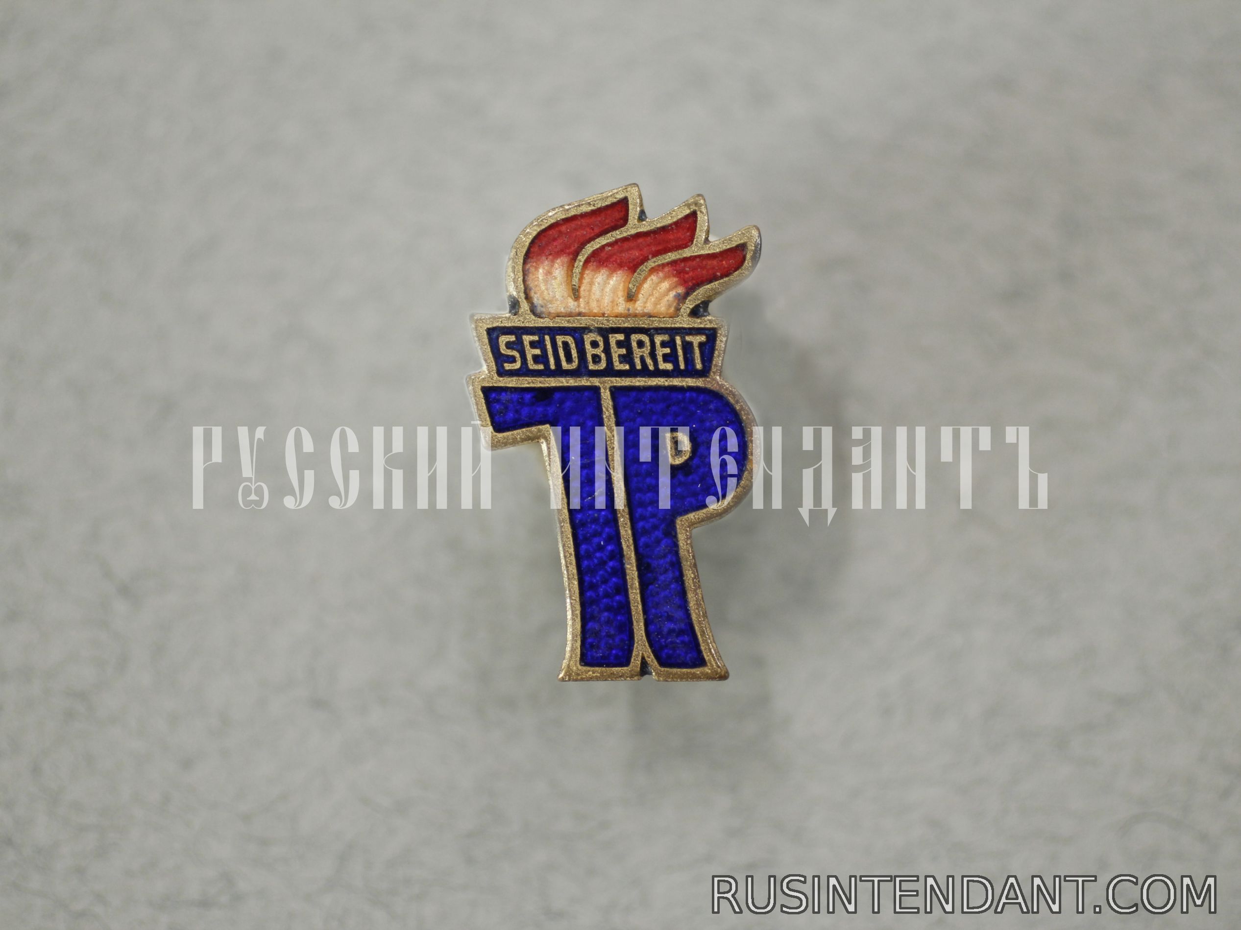 Фото 1: Пионерский знак ГДР 