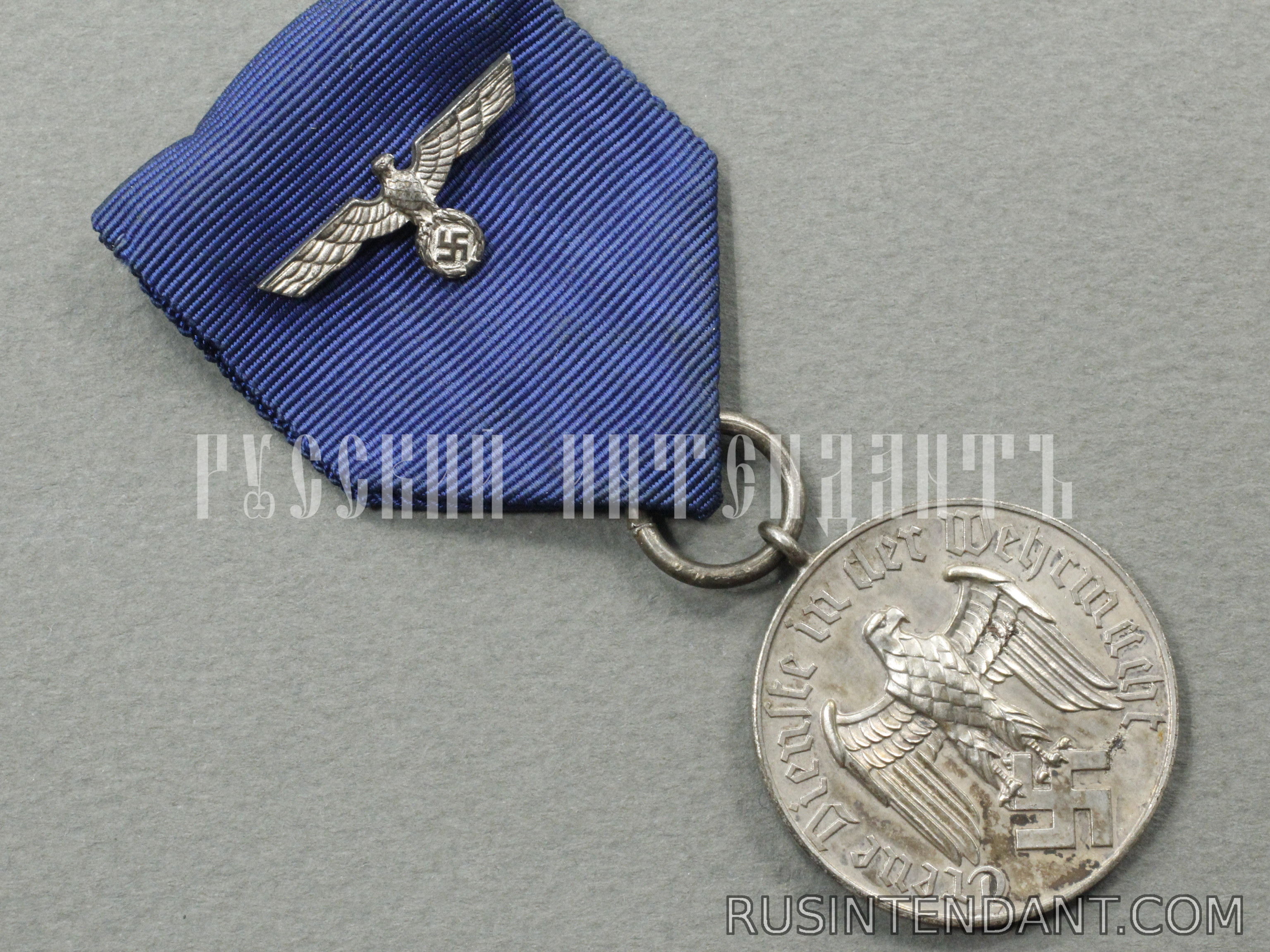 Фото 3: Медаль за 4 года выслуги на ленте 