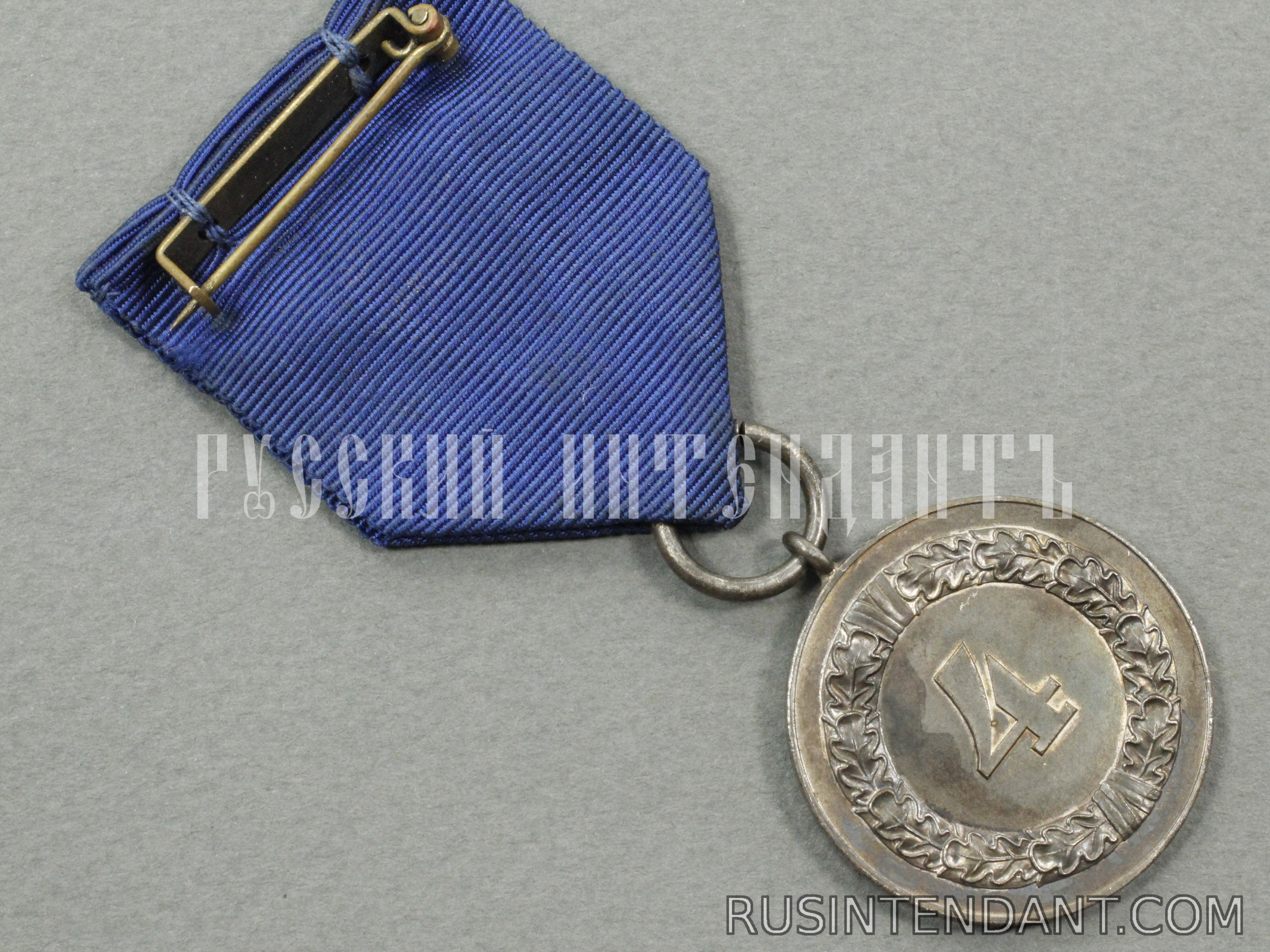 Фото 4: Медаль за 4 года выслуги на ленте 