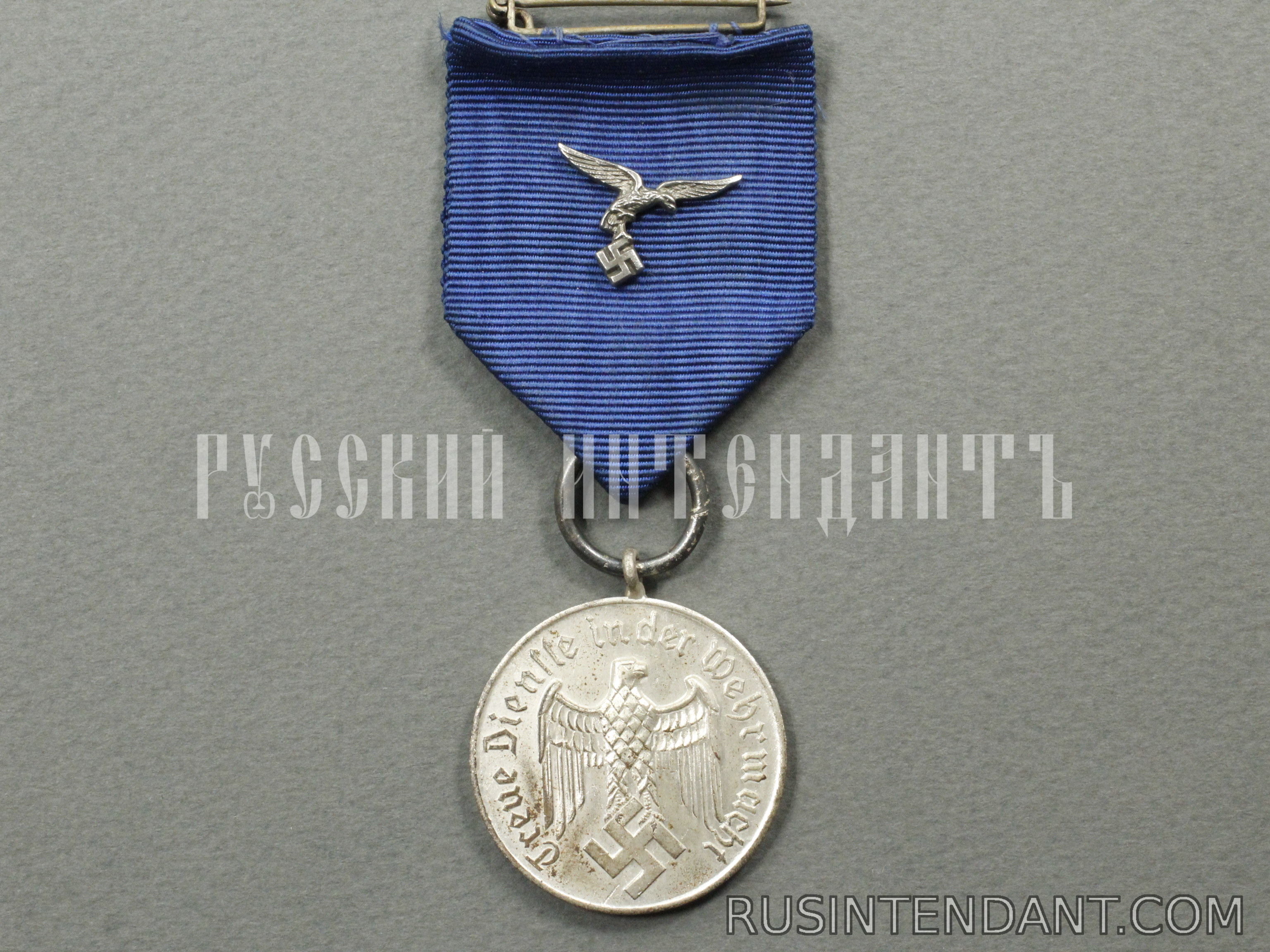 Фото 1: Медаль за 4 года выслуги на ленте 