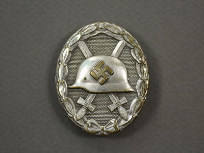 Знак "За ранение" серебряный